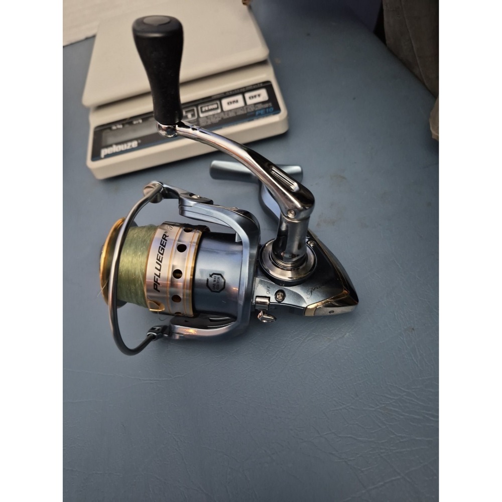 pflueger president 6935 spinning reel 10lb Prespooled EXC ELLENT CONDITION